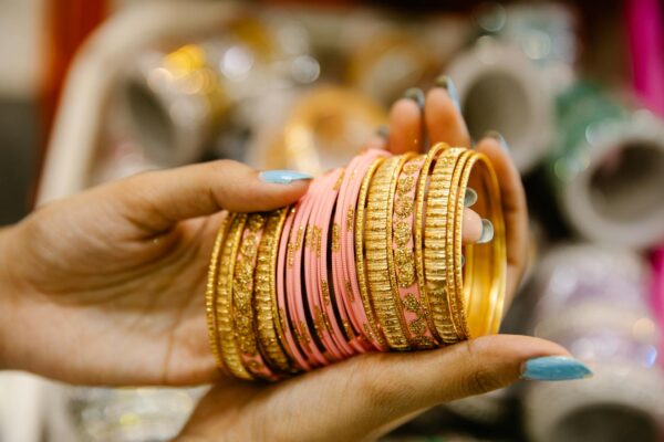 Person Holding Bracelet